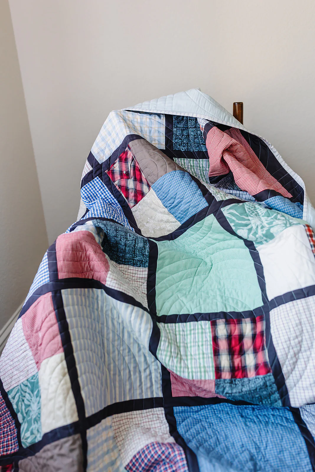 Memory quilt with keepsake clothing